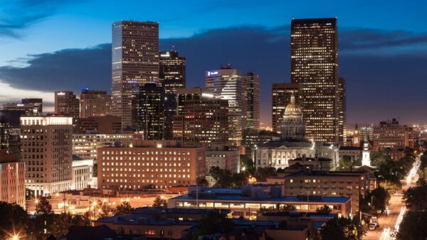 View from 1000 Grant overlooking Denver at dusk.