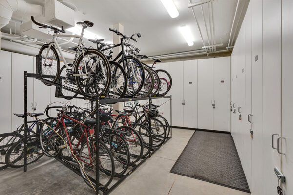 Storage room with bike racks and lockers.