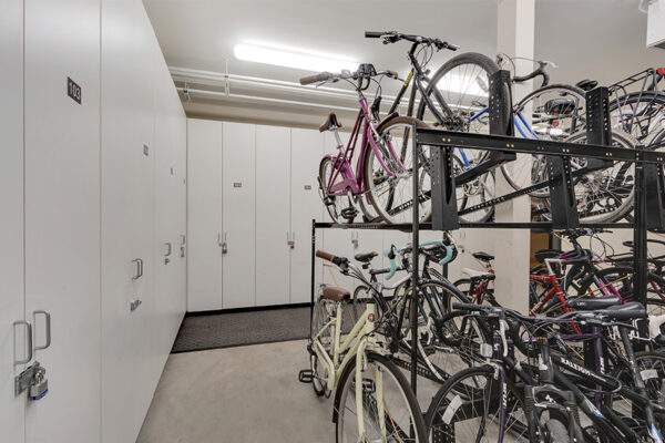 Storage room with bike racks and lockers.