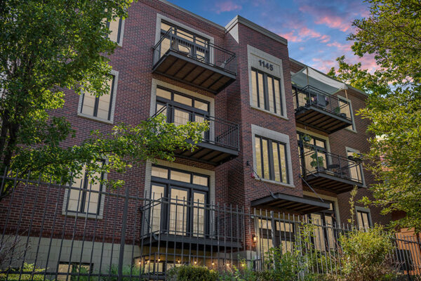 1145 Ogden apartments with contemporary architecture and brick construction.