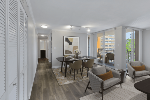living room with a view down the hallway to the bedroom