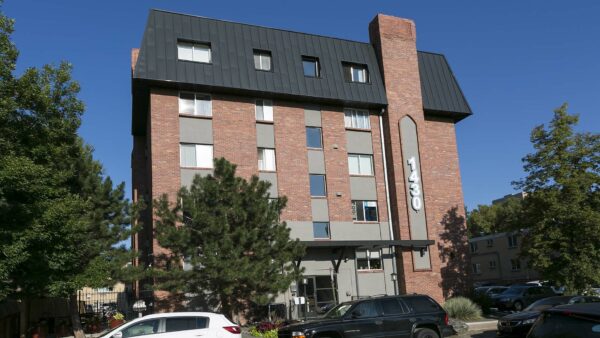 1430 Humboldt apartments with classic brick construction and mature trees.