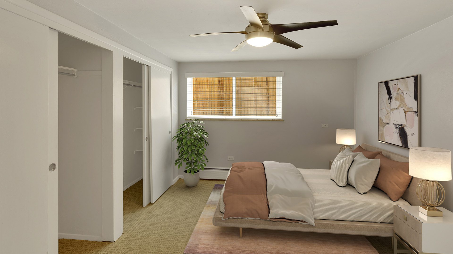 1435 Franklin bedroom with large bed, ceiling fan, and framed artwork.