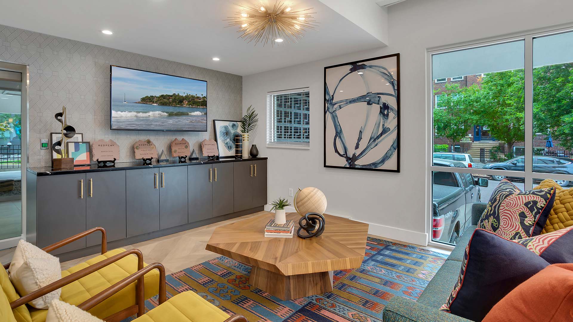 Clubhouse with artwork and a seating area.