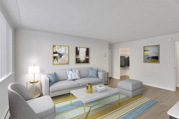 Apartment living room with wood floors and modern furniture.