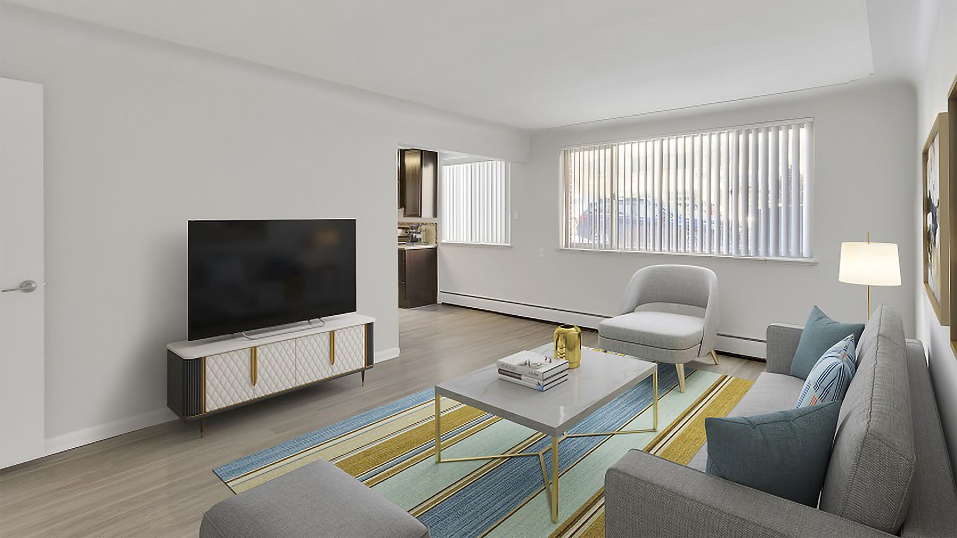 Apartment living room with wood floors and modern furniture.