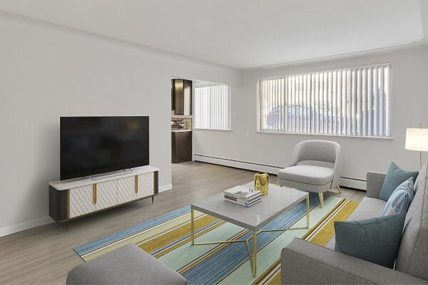 Apartment living room with wood floors and modern furniture.