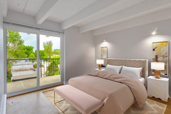 Rendering of a bedroom with a door to the patio, white walls, and a plush bed.
