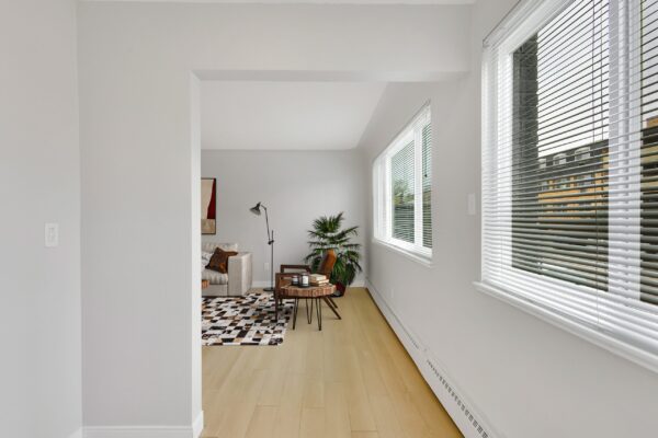 view looking from kitchen into living room and couch
