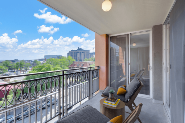 large balcony with chairs and coffee table