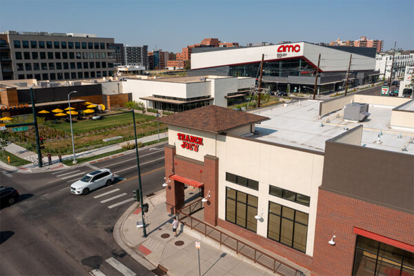 Aerial view of Trader Joe's and AMC theaters nearby.