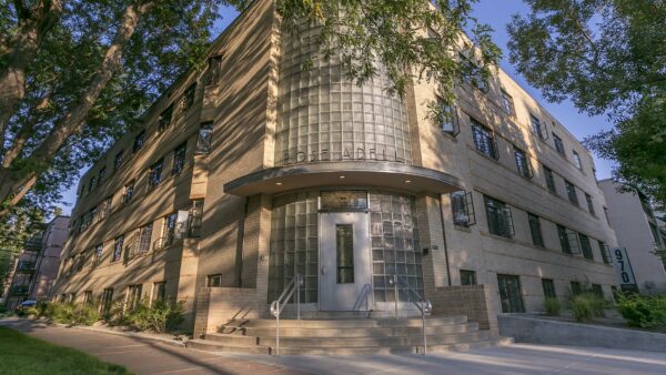 970 Penn apartment entrance with art deco sign reading Rose Adell above door.