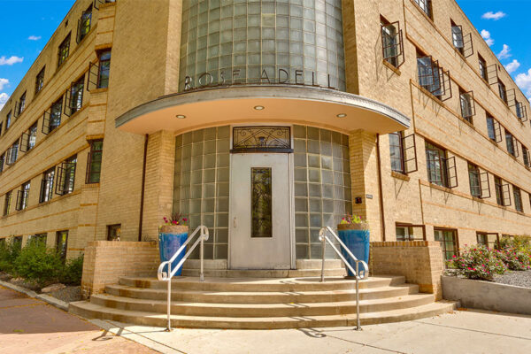 970 Penn apartment entrance with art deco sign reading Rose Adell above door.