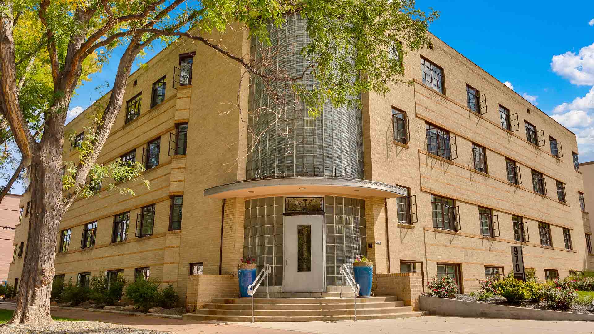 970 Penn apartment with glass brick construction and art deco style Rose Adell sign.
