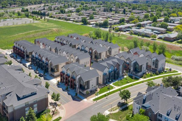 Aerial view of Dayton Station townhomes with nearby houses.
