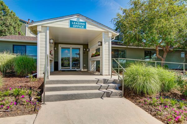 Hadley leasing office with lush landscaping and ADA ramp.