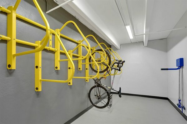 Bike repair room with bike storage racks and bike repair rack.