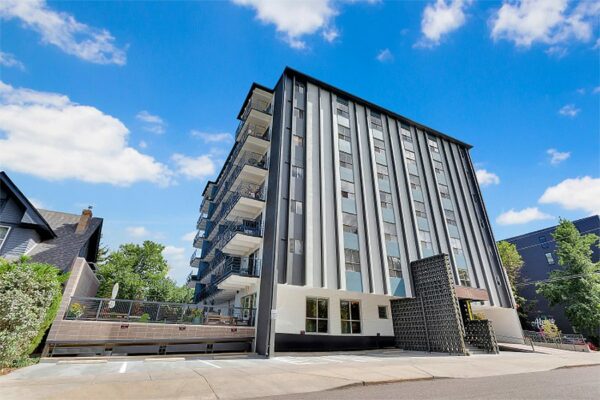 Liv on Steele apartment exterior with modern architecture and large balconies.