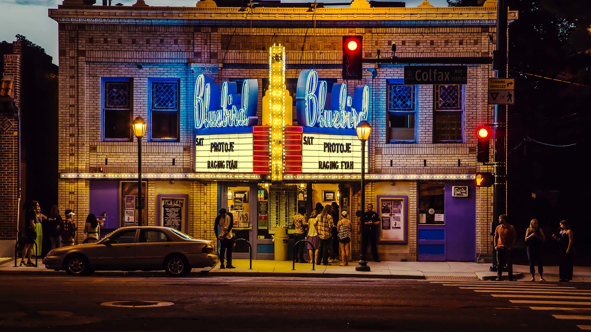 Bluebird Theater on Colfax with bright neon marquee signage.