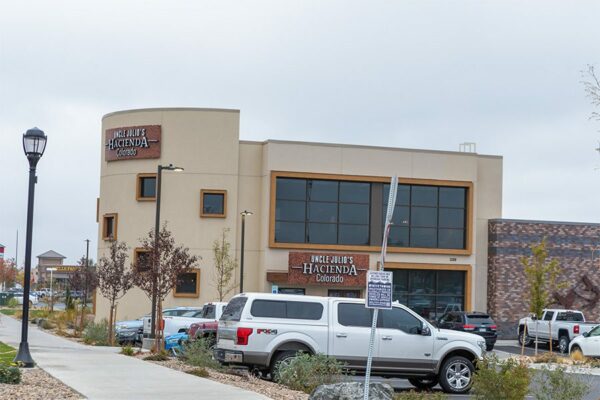 Hacienda Colorado restaurant with large parking lot.