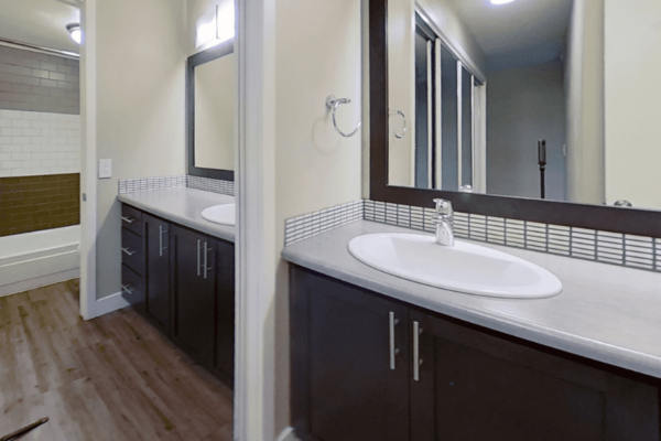 Bathroom sink with mirror on studio bedroom