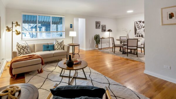 one bedroom apartment with large living room and dining seating