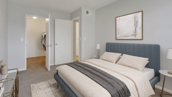 bedroom with decorations and view of hallway