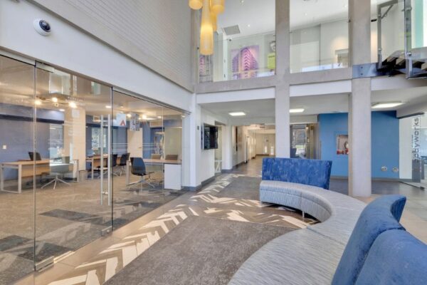 lobby entrance with view of the office and the couch
