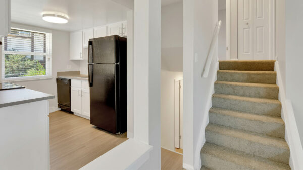 Stairway to bedrooms, overlooking kitchen.