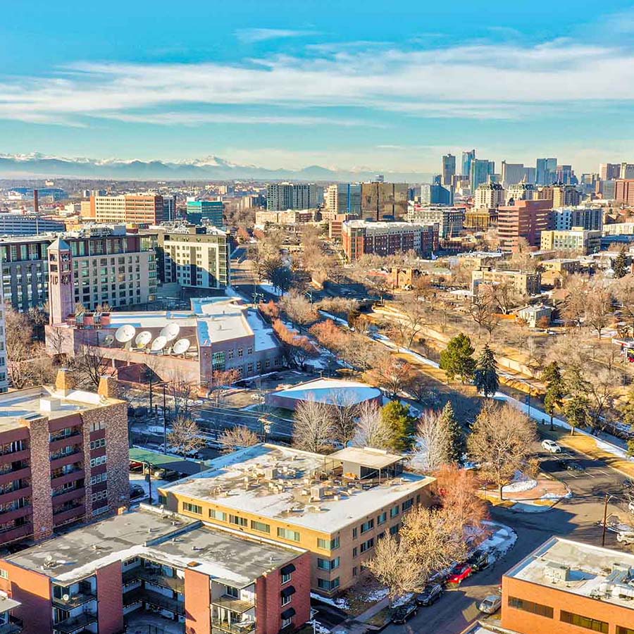 Aerial view of 550 East 3rd Avenue looking northwest towards Denver and the foothills.
