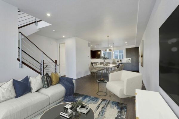 Rendering of an open-concept living room, dining room, and kitchen.