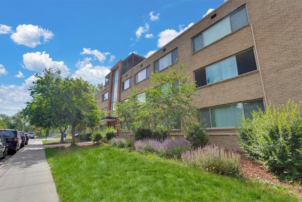 Five50 apartments with brick exterior and lush landscaping.