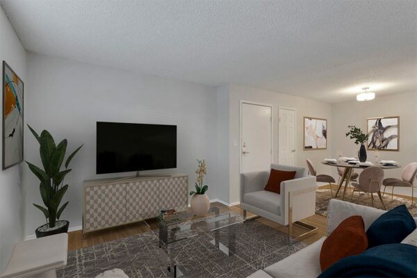 Rendering of a living room connected to a dining room, with carpet over wood floors, white walls, and art work.
