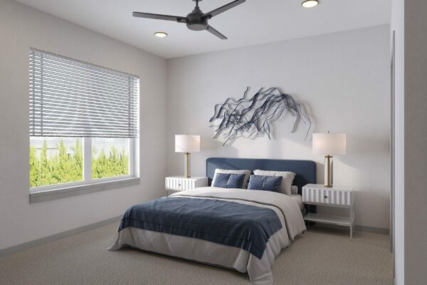 Bedroom with plush bed, bedside tables with lamps, and large window.