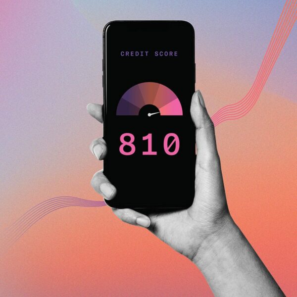 Person holding a phone displaying their credit score on colorful gradient background.