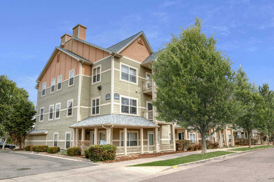 building with trees in front