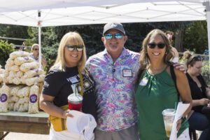 three people posing for a picture