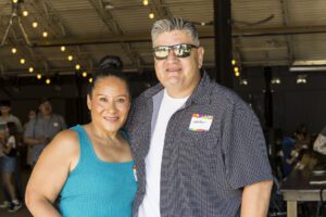 two people posing for picture