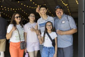 family posing for photo