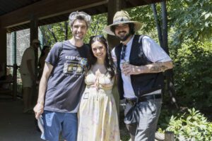 three people posing for photo